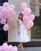 Civil ceremony dress with neckline, sleeves, and ruffles