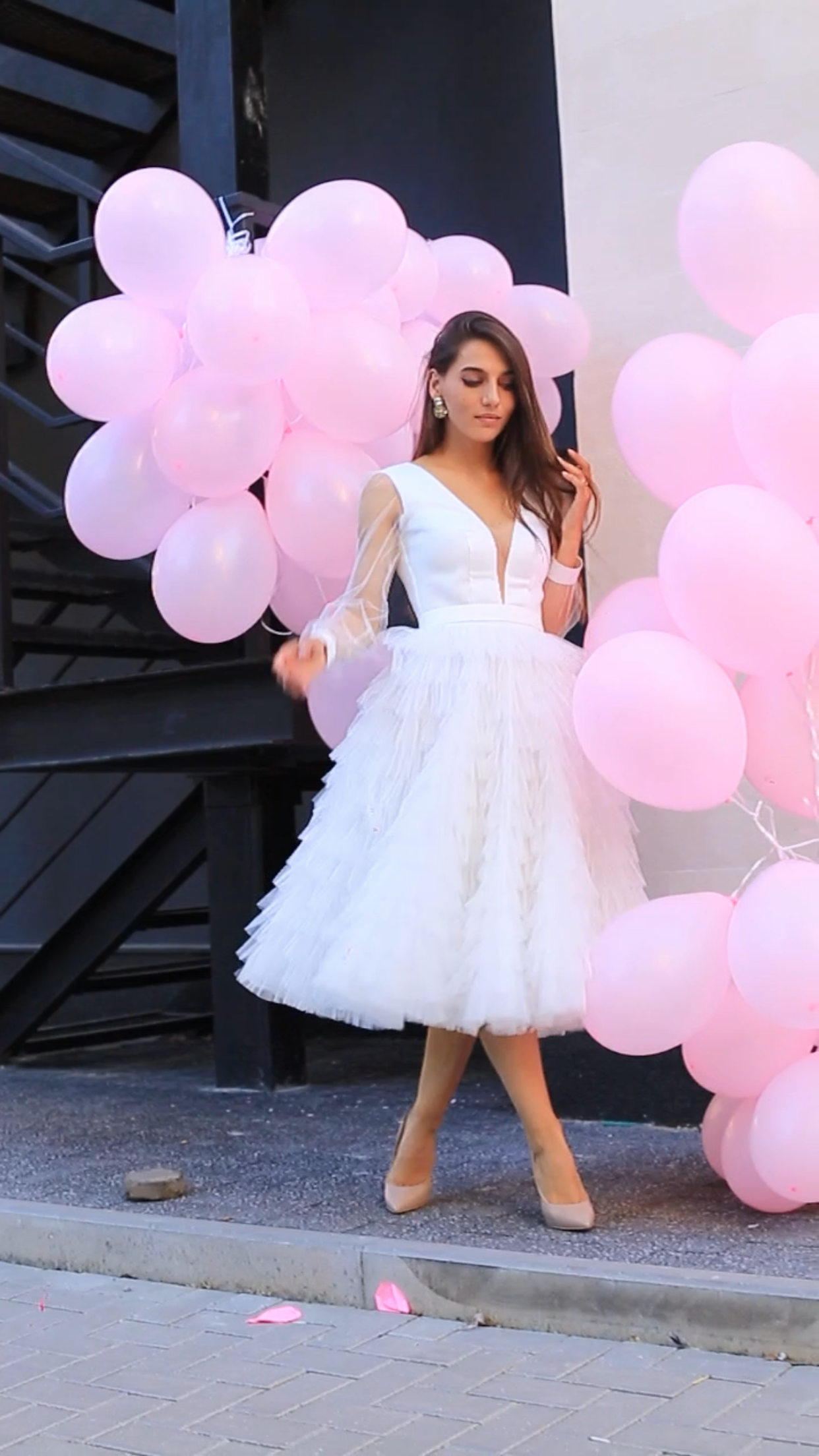 Civil ceremony dress with neckline, sleeves, and ruffles