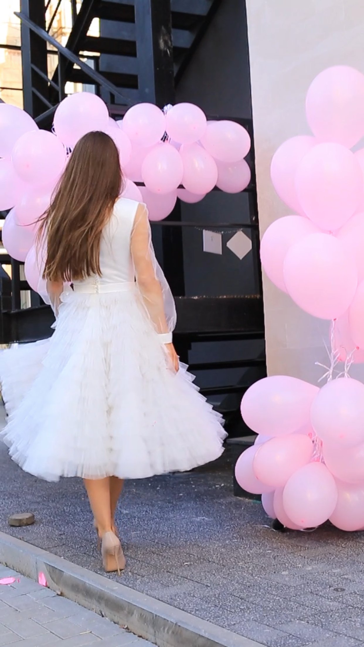 Civil ceremony dress with neckline, sleeves, and ruffles