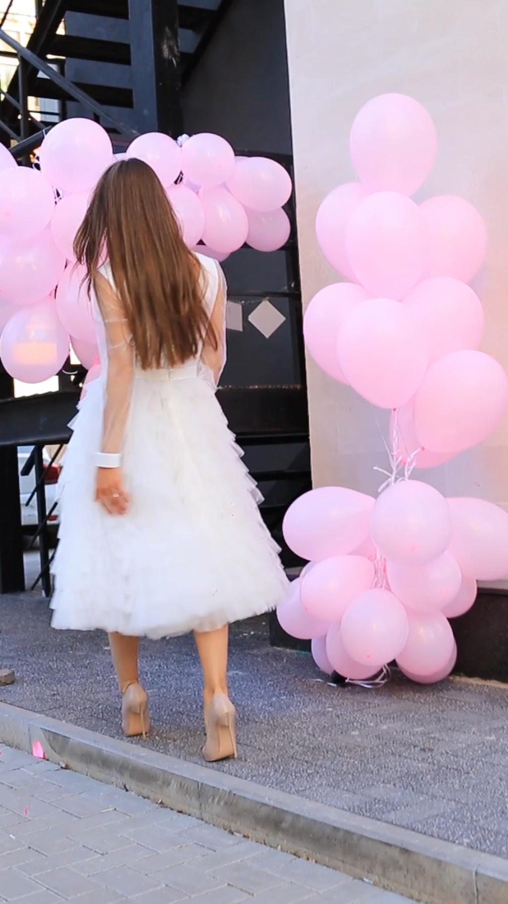 Civil ceremony dress with neckline, sleeves, and ruffles