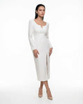 Elegant white dress with long sleeves and slit