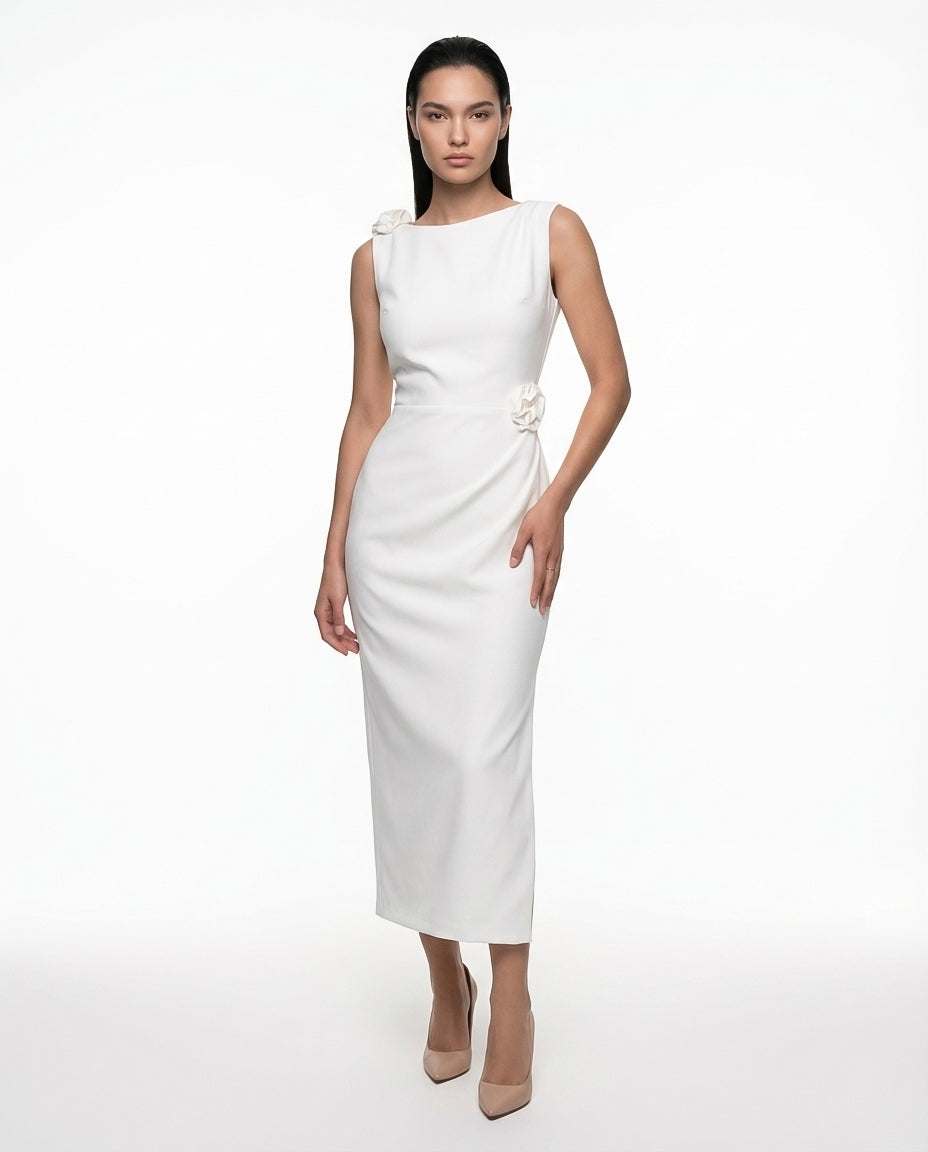 White sleeveless midi dress with a fitted silhouette, elegant wrap design