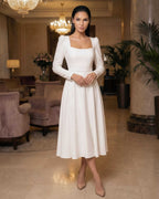 White midi dress with long sleeves made of crepe for civil and religious wedding